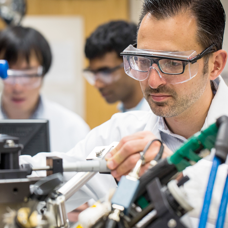 researcher working with equipment