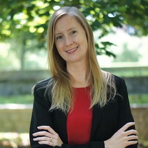 Picture of Dr. Thomas standing outside